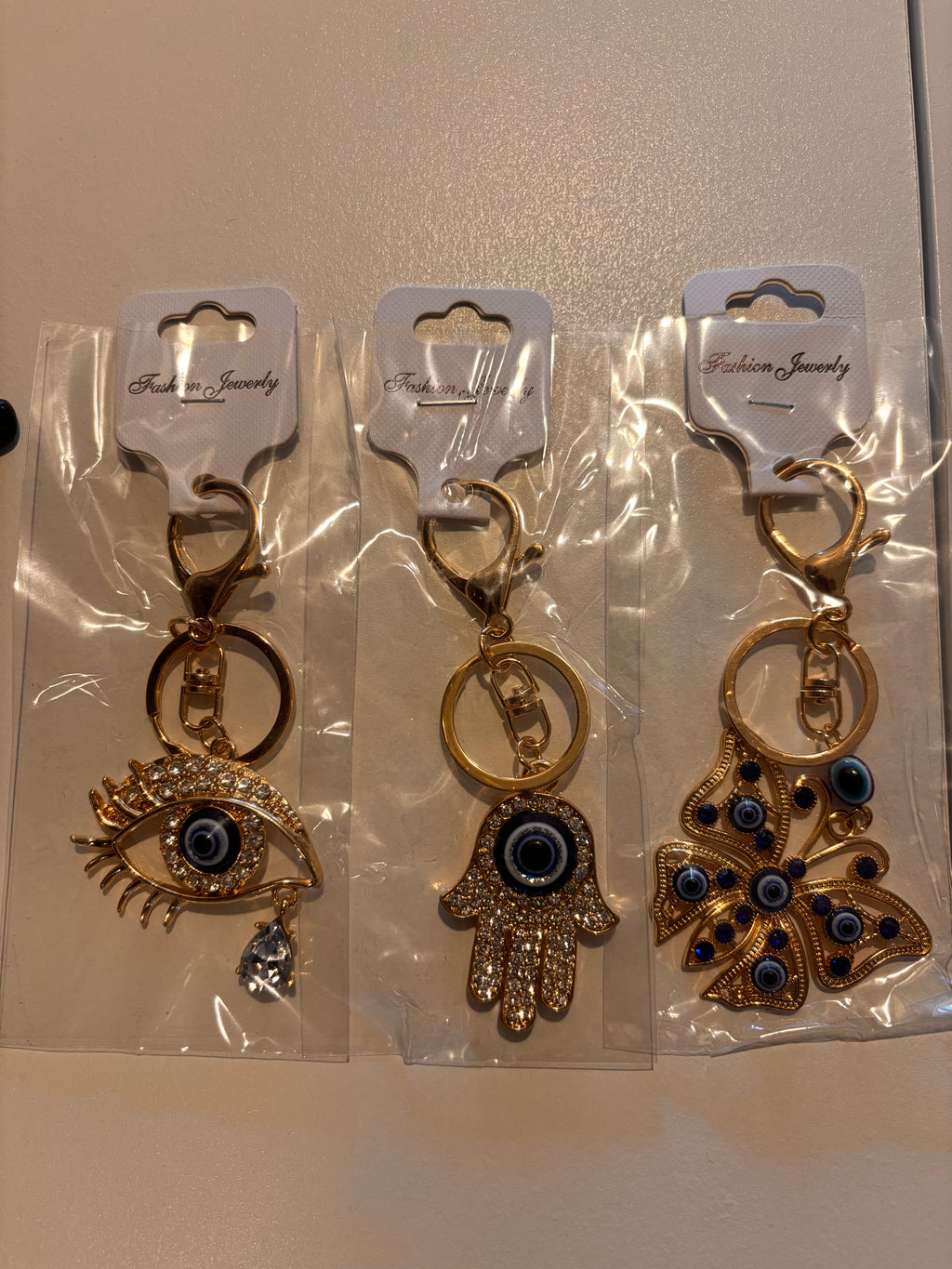 Gold-Tone Evil Eye Rhinestone Keychain